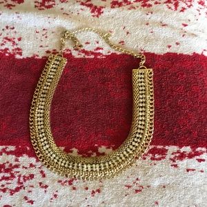 Gold and cubic zirconia  statement necklace
